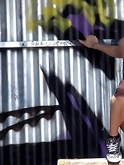 15 pictures - Cute redhead pisses onto a wooden bench