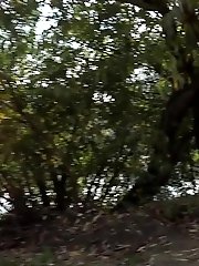 15 pictures - Brunette girl keeps a lookout while pissing