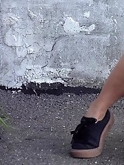 15 pictures - Gorgeous girl uses her phone while pissing outside