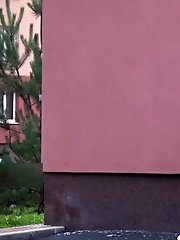 15 pictures - Sexy brunette pisses in the middle of a car park