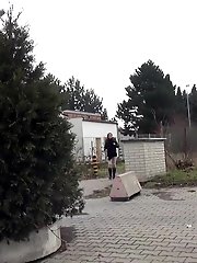 15 pictures - Redhead babe pisses in the middle of the city