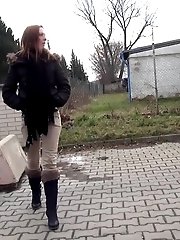 15 pictures - Redhead babe pisses in the middle of the city