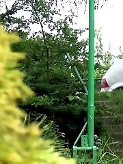 15 pictures - Sexy brunette pees in the playground