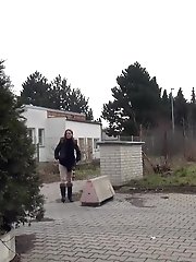 15 pictures - Redhead babe pisses in the middle of the city