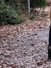 15 pictures - Playful babe nearly wets her panties outside