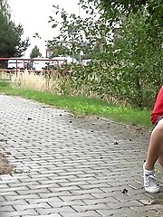 15 pictures - Dark haired exotic babe squatting to pee outside