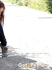 15 pictures - Cute babe rushes to beat her pee desperation