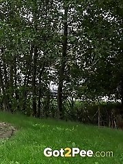 15 pictures - Dark haired exotic babe squatting to pee outside