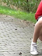 15 pictures - Dark haired exotic babe squatting to pee outside