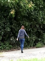 15 pictures - Sexy brunette pisses over the train tracks