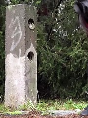 15 pictures - Dark haired girl squats to piss on a road