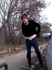 15 pictures - Brunette girl squats near a car to piss outside