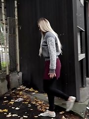 15 pictures - Pretty blonde squats to piss outside in the city