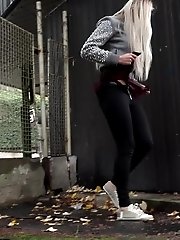 15 pictures - Pretty blonde squats to piss outside in the city