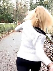 15 pictures - Playful babe nearly wets her panties outside