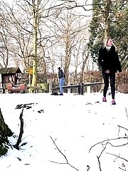 15 pictures - Cute blonde pisses in the snow outside
