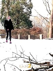 15 pictures - Cute blonde pisses in the snow outside