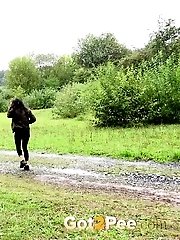 15 pictures - Exotic babe squats behind parked car to piss