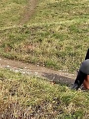 15 pictures - Dark haired babe pisses in the countryside