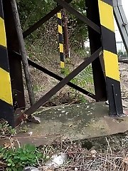 15 pictures - Next to a train line this hottie pisses
