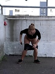 15 pictures - Gorgeous girl uses her phone while pissing outside