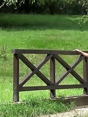 15 pictures - Gorgeous redhead lifts up her leg to pee outside