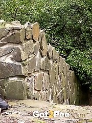 15 pictures - brunette babe relieves herself while outdoors