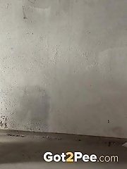 15 pictures - Hot babe makes a pissy puddle on the floor