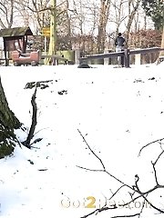 15 pictures - Cute blonde pisses in the snow outside