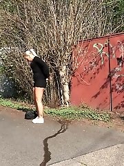 15 pictures - Hot blonde Naomi squats on the road to piss