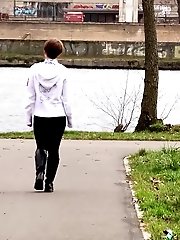 15 pictures - Short haired babe sprays her piss over the ground