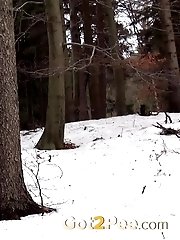 15 pictures - Hot brunette nearly pisses herself in the snow