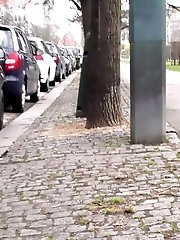 15 pictures - Sexy European has a much needed piss outside