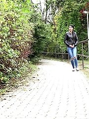 15 pictures - Exotic babe pisses twice in this outdoor scene