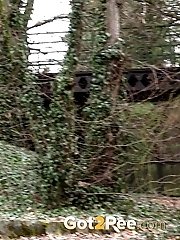 15 pictures - Blonde in denims squats outside to relieve herself