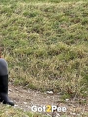 15 pictures - Dark haired babe pisses in the countryside