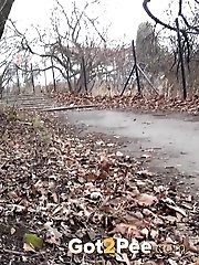 15 pictures - Stunning dark haired girl is caught pissing