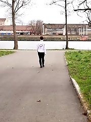 15 pictures - Short haired babe sprays her piss over the ground