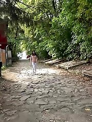 15 pictures - Dark haired babe squats outside and pisses
