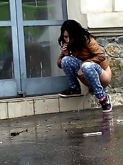 15 pictures - Gorgeous dark haired girl pees in public