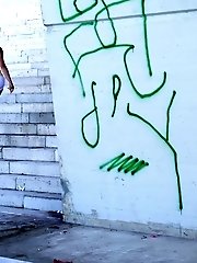 15 pictures - Sexy dark haired girl fires piss onto the concrete