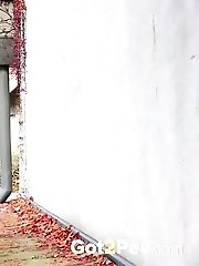 15 pictures - Gorgeous brunette pisses right next to a busy road