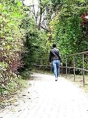 15 pictures - Exotic babe pisses twice in this outdoor scene