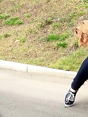 15 pictures - Redhead babe pulls down her denims to piss