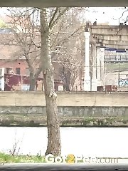 15 pictures - Redhead babe pulls down her denims to piss