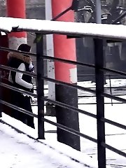 15 pictures - Watch the snow melt as this dark haired babe pees