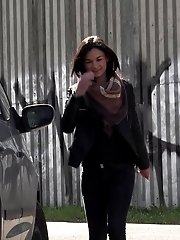 15 pictures - City pissing for stunning black haired babe