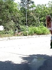 15 pictures - Outdoor pissing for gorgeous blonde in shorts