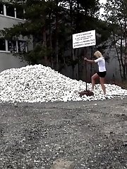 15 pictures - Cute girl pisses onto a pile of rubble