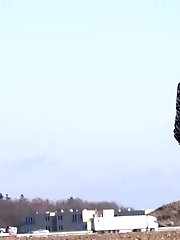 15 pictures - Gorgeous redhead sprays her piss on a driveway